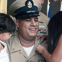 U.S. Air Force Lt. Col. John Cudar (center), pilot