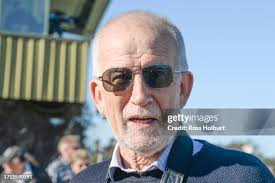 Paul Cumming and son after winning the CHS Construction Maiden Plate...  News Photo