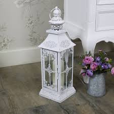 White lantern table decorations, rustic lantern candle holder, lanterns, table decoration. Antique White Vintage Metal Candle Lantern Flora Furniture