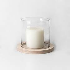 One hurricane candle holder with your favorite scented votive makes a contemporary statement placed on the mantel or in the dining room, while two or three can create the base for a romantic centerpiece. Plywood Hurricane Candle Holder That Little Shop