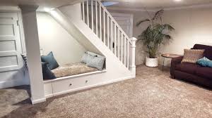 Install comfortable beige carpet or durable wood laminate with a warm maple finish. 75 Beautiful Small Carpeted Basement Pictures Ideas June 2021 Houzz