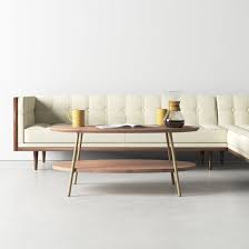 Stash coasters, remote controls, and spare chargers out of sight with this modern storage coffee table. Kristin Solid Wood Storage Coffee Table Allmodern