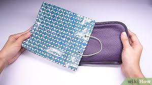 You can make a normal paper bag a gift bag by decorating it! How To Make A Bag Out Of Paper With Pictures Wikihow