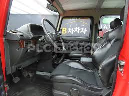 Image result for Garnet Red 1995 SsangYong