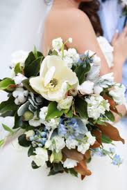 March wedding bouquets blue and white magnolias. Southern Bridal Bouquet Magnolias Cotton Light Blue Wildflowers White Floral 2019 Cotton Diy Magnolia Wedding Magnolia Wedding Flowers Wedding Bouquets