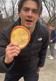 Throwing A Pizza Like A Frisbee in Oven