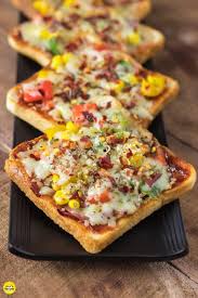 Bread Pizza Recipe In Hindi Made With Sliced Bread And Pizza Stuffing Cook On Mediu In 2020 Sandwich Recipes Indian Bread Pizza Recipe Indian Breakfast Recipes Easy