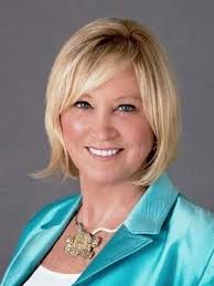 Realtor Pat Mayer receive Business Excellence Award