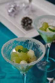 8 pile the melon, orange and grapefruit mixture onto the 4 melon shells so that there are equal amounts divided between the 4 melon shells. Christmas Day Starter Grape And Melon With Mint Gimme The Recipe