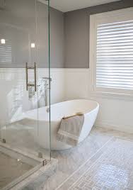 Classic Master Bath With Freestanding Tub And Mosaic Marble Tile Floor Mat By Cw Design Llc Lookbo Free Standing Tub Marble Tile Floor Marble Bathroom Floor