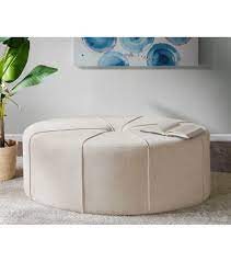 It can also function neatly as a coffee table, using a wooden try or reversible cushion top. Cream Fabric Oval Coffee Table Ottoman With Welting