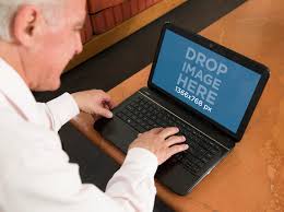 Placeit Pc Mockup Of An Elderly Man With A Laptop At Home Hp Laptop Elderly Man Laptop Screen
