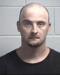 Man accused hitting three with tire iron, one with fist