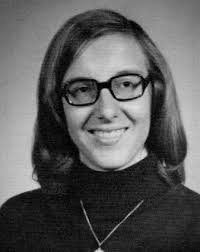 1975 graduation photo of a very busy lady