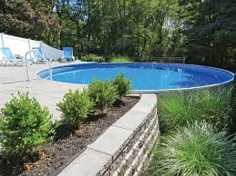 Metric Round 3 Hot Tub Swimming Pool Store Of North Carolina Raleigh Greensboro And Concord Backyard Radiant Pools Above Ground Pool Pool Landscaping