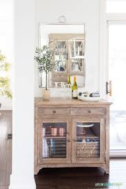 Storage on the inside, display space for candles, artwork, or collectibles on the outside. Coastal Dining Room Refresh Storage Solutions Dining Room Storage Small Dining Room Storage Coastal Dining Room