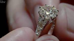 The diamonds—a center stone flanked by 10 smaller pave diamonds—were. Royal Wedding Is Queen S Engagement Ring More Than Kate Middleton Or Meghan S Express Co Uk