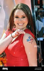 Jane Erin Carrey ( Jims daughter ) Horton Hears A Who ! Premiere at the  Westwood Theatre In Los Angeles. three quarters eye contact smile tattoo  canadian maple leaf and US flag