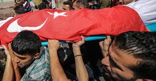 ### fılıstın bayragı ve anlamı ###. Filistinli Sehidin Uzerinde Turk Bayragi Detayi Dunya Haberleri