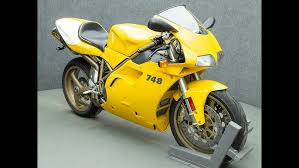 Image result for Nuget Yellow 1999 Motorcycle