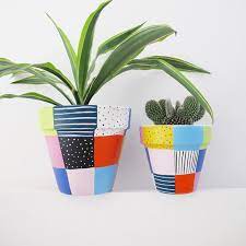 Whether plain or decorated, they add beauty and structure to the garden! A Hand Painted Plant Pot With Bright Patchwork Design A Wonderful Home For Any Plant Measures 11cm High Painted Plant Pots Painted Pots Diy Plant Pot Design