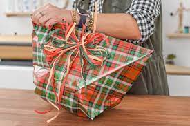Add gift tags and colorful ribbon to your gift to. Make A Gift Bag From Leftover Wrapping Paper Hgtv