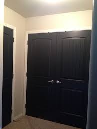 Painted squares in high gloss over eggshell paint of same color for subtle shimmer on walls! My Doors Painted Black Benjamin Moore Aura In Eggshell Onyx Painted Doors Tall Cabinet Storage House