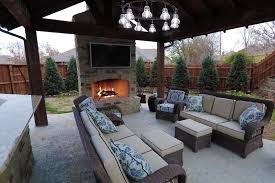 An outdoor fireplace makes a cozy addition to your setting, lending a warm welcome and an ambiance perfect for entertaining into the evening. Fire Pits Outdoor Fireplaces Professional Landscaping Services Nelson Landscaping