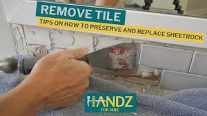 Once you hit thinset, scrape it away and sand down the area. How To Remove Backsplash Tile Like A Champ Youtube