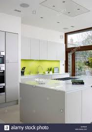 lime coloured backsplash in modern