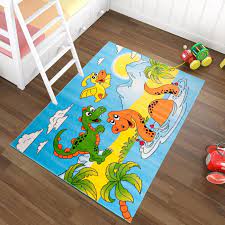Dieser aus hochwertigem und widerstandsfähigem kunststoff gefertigte teppich ist so vorbereitet, dass die. Tapiso Kinder Teppich Kurzflor Kinderteppich Spielteppich Dino Dinosaurier Teich Muster Blau Gelb Bunt Kinderzimmer Okotex Tapiso Teppiche Online