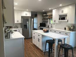 The very modern look of a kitchen with its white shaker cabinets. 23 Inspiring Shaker Cabinets Pictures Design Ideas