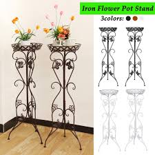 Tall potted plants help to give a focal point to a container garden. 2pcs Metal Tall Plant Iron Flower Pot Stand Flower Holder Garden Patio Home Indoor Outdoor Decor Buy At A Low Prices On Joom E Commerce Platform