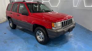 Image result for Flame Red 1996 Jeep