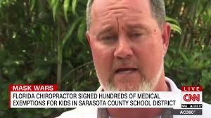 CNN's Randi Kaye attempts to speak with chiropractor Dan Busch, who despite  not being a medical doctor, wrote medical exemptions for students wishing  to opt-out of wearing masks in Sarasota County ...