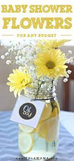 Spectacularly Beautiful Baby Shower Flowers On Any Budget Diy Baby Shower Decorations Baby Shower Flowers Baby Boy Shower Favors