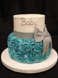 Buttercream Base With Piped Buttercream Rosettes And Fondant Bow By Party Flavors Custom Cakes Baby Shower Cakes For Boys Baby Boy Cakes Torta Baby Shower