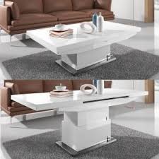 The table can grow from 60 by 80 cm (about 23.5 by 31.5 in) when collapsed to a maximum length of 170 cm (67 in) and. Elgin Extending Coffee In To A Dining Table In White Gloss In 2020 Coffee Table Dining Table Adjustable Height Coffee Table