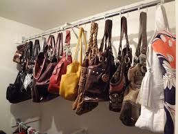 In order to combat this, store your purses in a part of your closet that does not get hit by direct sunlight. How To Organize Your Handbags And Purses Glam Radar Organizing Purses In Closet Purse Organization Shoe Organization Closet