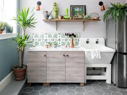 bright mudroom features a utility sink