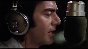 In "The Jazz Singer," which airline did Neil Diamond's character fly to Los  Angeles? A: American Airlines B: United C: TWA D: Delta