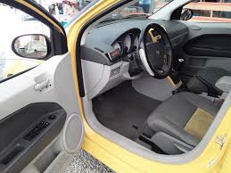 Image result for Solar Yellow 2007 Caliber