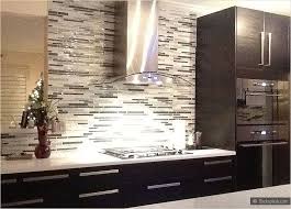 With its variety of sizes, shapes, iridescent colors and chic patterns, glass tile is a natural choice for kitchen backsplashes, shower surrounds, and commercial installations. Gray White Glass Brick Backsplash Tile Mosaic Tile Backsplash Kitchen Kitchen Backsplash Pictures Kitchen Backsplash Designs