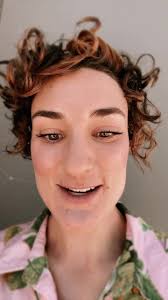 Obsessed with this loose soft curly low bun