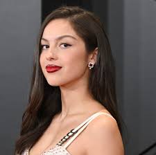 Olivia Rodrigo Wears Low-Cut White Gown at the 2024 Grammys