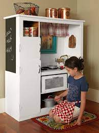 Route edges of diy cabinet doors frame pieces. How To Turn An Old Entertainment Center Into A Play Kitchen How Tos Diy