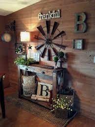 These windmills are also used as toys for children and decorations for outdoor gatherings. 25 Make Your Own Farmhouse Windmill Decor Farmhousewindmilldecor Farmhousedecor Farmhouseideas Home Design Farm House Living Room Rustic Wall Decor Decor