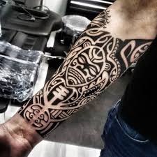 Red tribal tattoo on forearm. Tribal Forearm Sleeve Tattoos