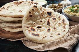 I often prepare the dough through the first rise, punch it down, and then keep it refrigerated for up to a week. How To Reheat Pita Bread The Best Way Foods Guy