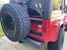 Image result for Flame Red 2005 Jeep